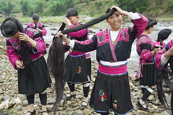Yao women have the longest hair in the world, without a single trace of grey or white. (jet black hair even for the grannies!)